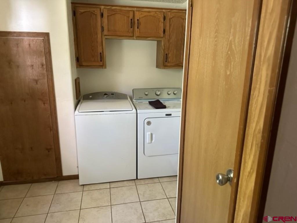 32 Hidden Lane Durango, CO 81303 - Photo 22 of 26 a utility room with dryer and washer