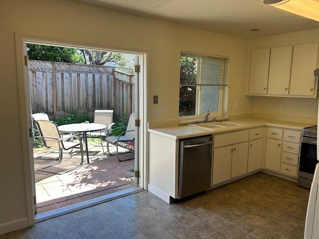 292 Perch Way Aptos, CA 95003 - Photo 3 of 10 a kitchen with a sink stove and cabinets