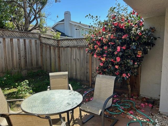 292 Perch Way Aptos, CA 95003 - Photo 5 of 10 a view of a chairs and table in a patio