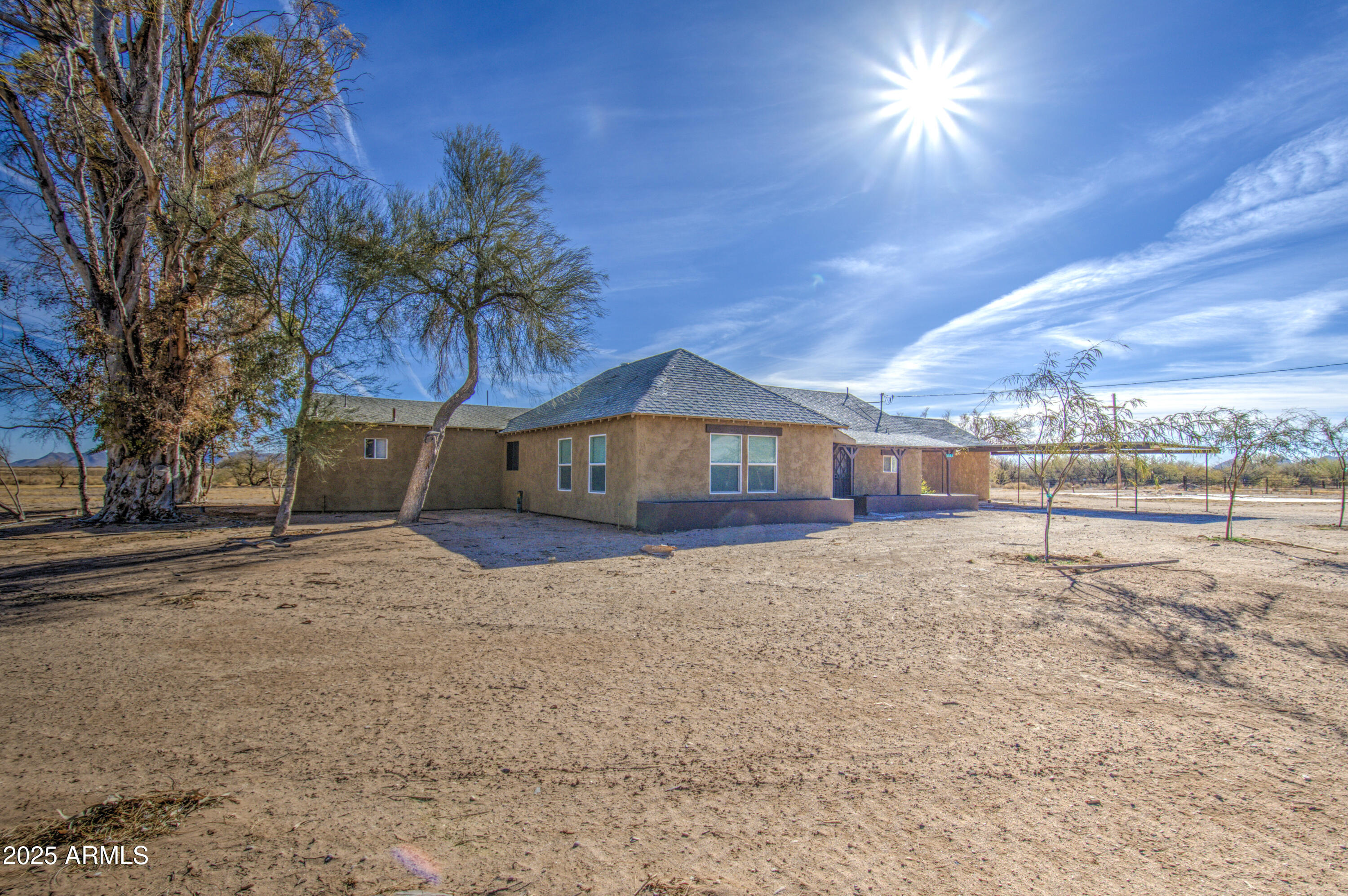 8050 South Bianco Road Casa Grande, AZ 85193 - Photo 17 of 96 a view of backyard of a house