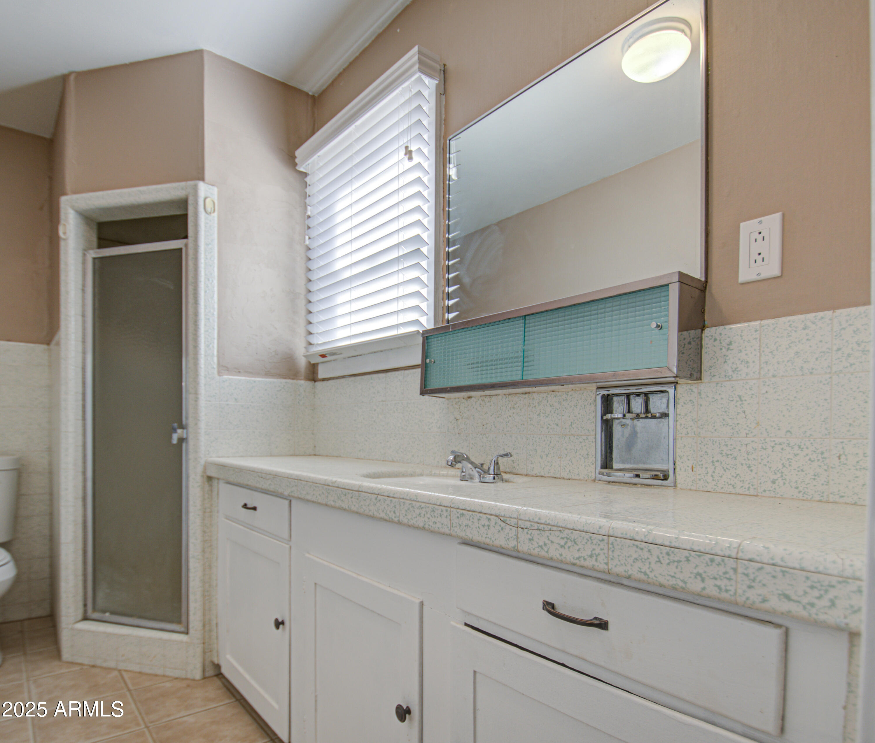 8050 South Bianco Road Casa Grande, AZ 85193 - Photo 21 of 96 a bathroom with a sink and a mirror