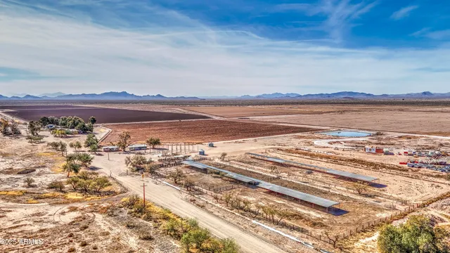 a view of a house with a backyard porch and sitting area