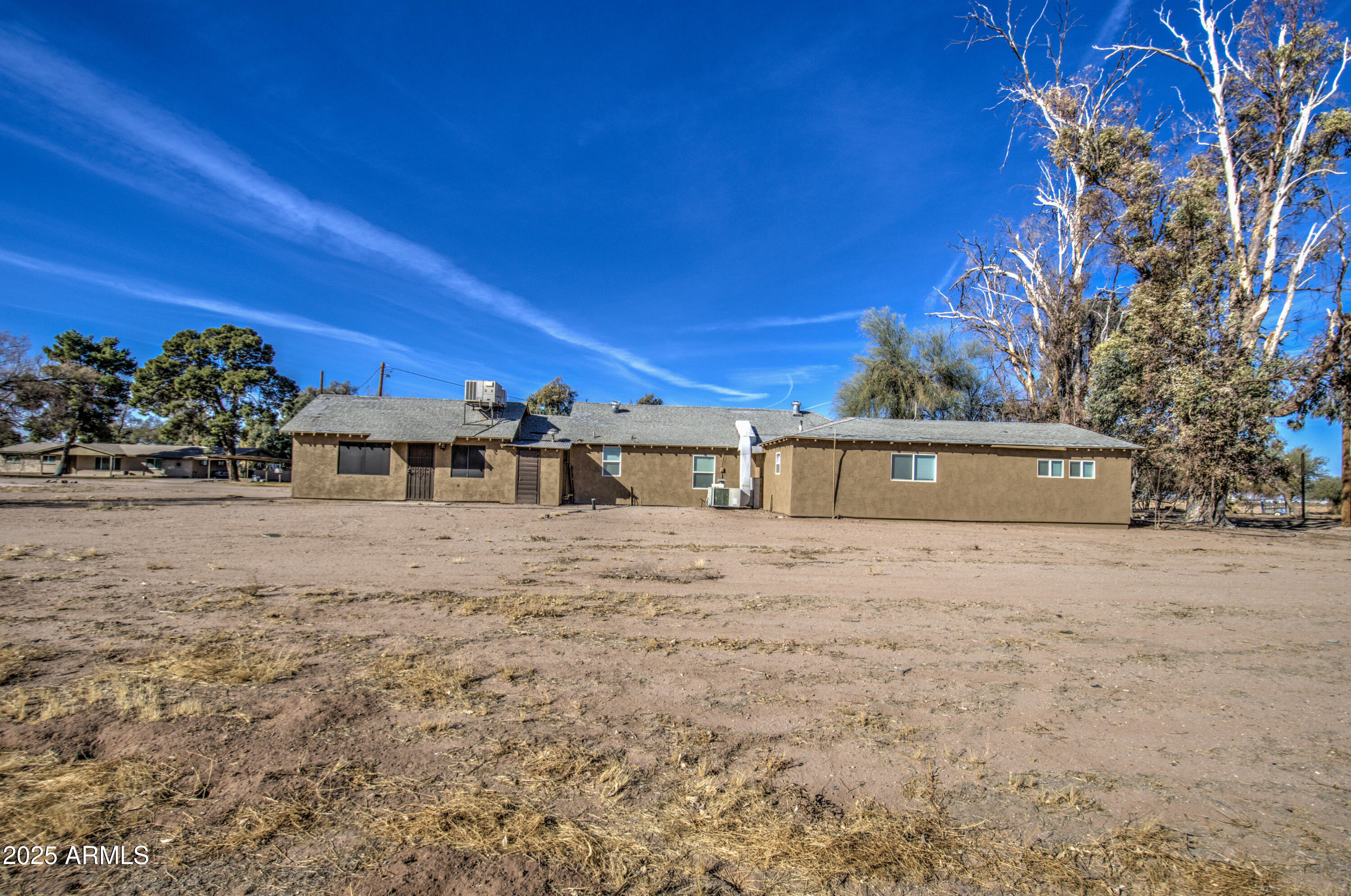 8050 South Bianco Road Casa Grande, AZ 85193 - Photo 47 of 96 a view of a house with a yard