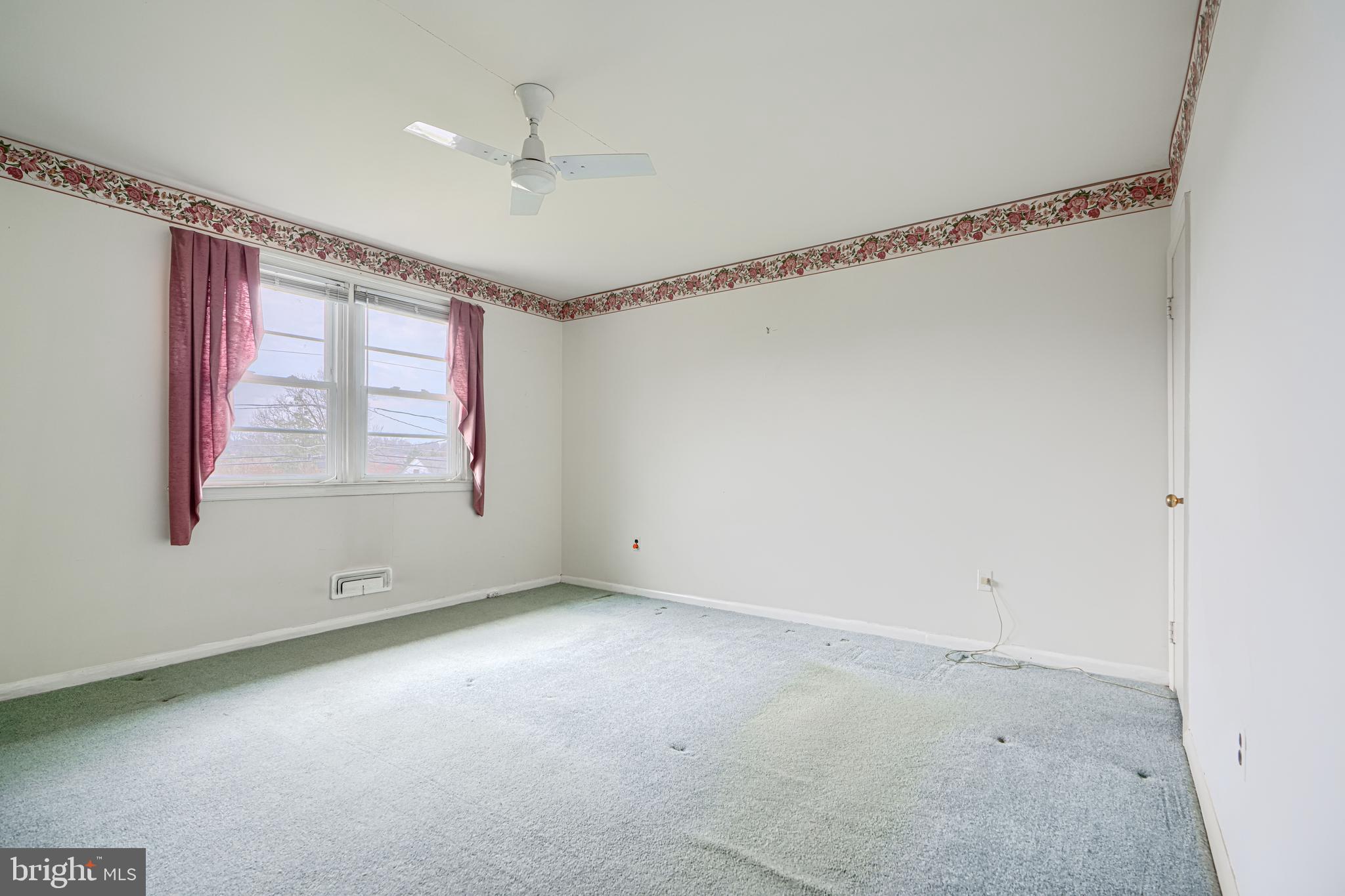 211 Rothwell Drive Lutherville-Timonium, MD 21093 - Photo 14 of 39 Primary bedroom-overlooks the back yard