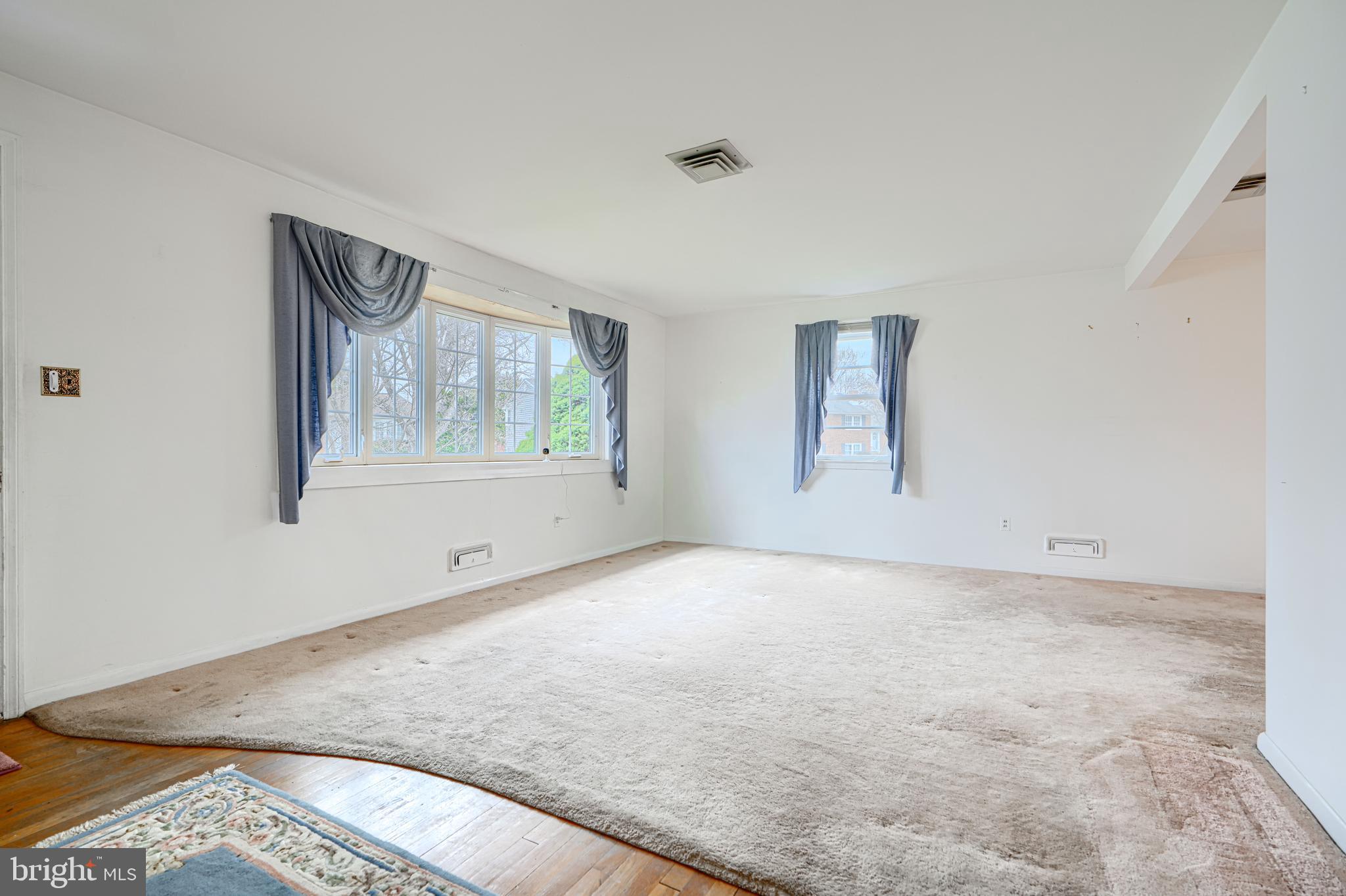 211 Rothwell Drive Lutherville-Timonium, MD 21093 - Photo 6 of 39 Living room -lots of natural light