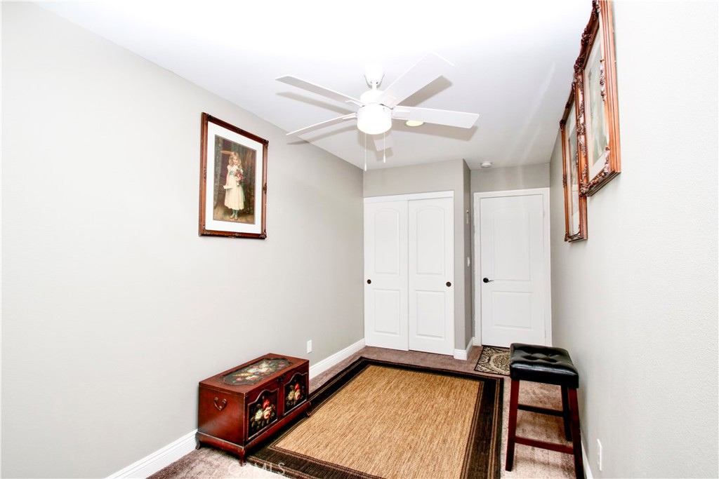 6202 Mandarin Road Yucca Valley, CA 92284 - Photo 19 of 24 a view of a hallway with workspace