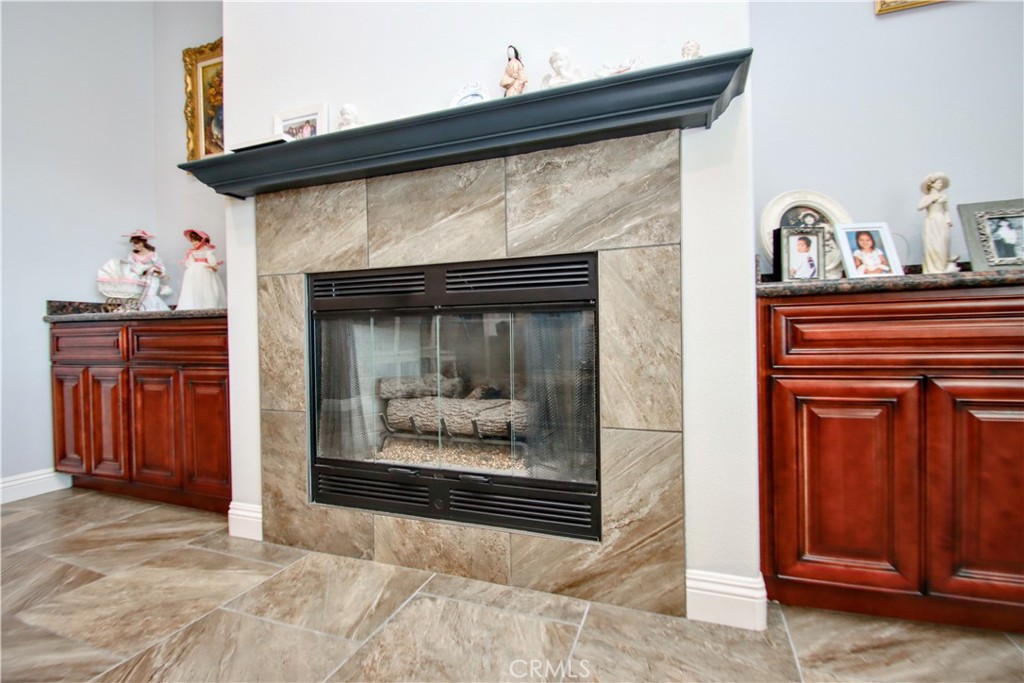 6202 Mandarin Road Yucca Valley, CA 92284 - Photo 9 of 24 a living room with furniture and a fireplace