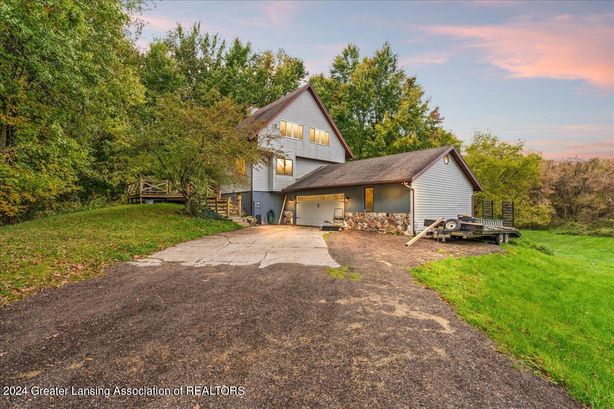 823 Wolverine Road Mason, MI 48854 - Photo 47 of 47 Front Exterior (Twilight)