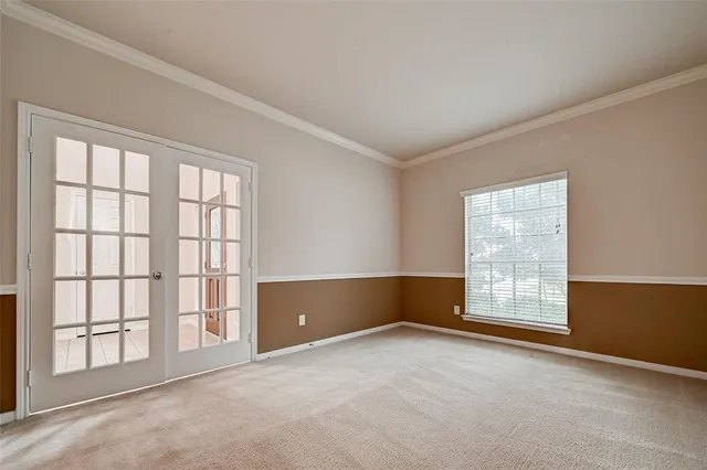 an empty room with windows