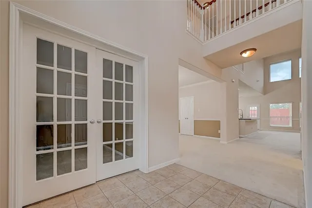 a view of empty room with windows