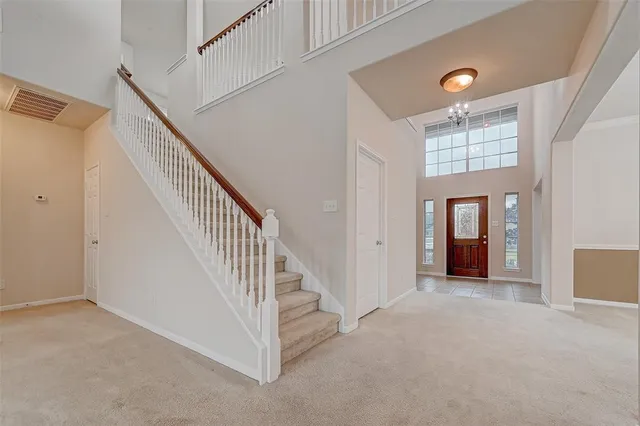 a view of an entryway with staircase