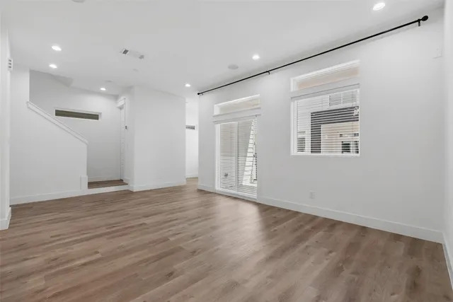 a kitchen with a sink stove and microwave