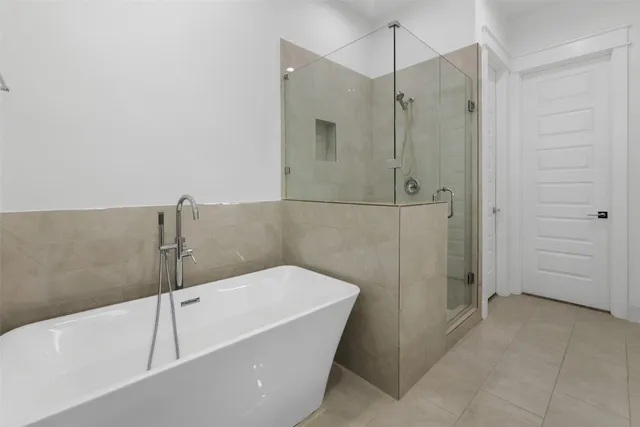 a view of staircase with white walls and stairs