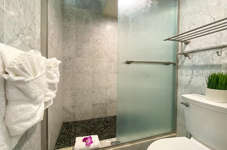 1775 Pe'e Road, Unit 101A Koloa, HI 96756 - Photo 13 of 25 a bathroom with a shower and a sink