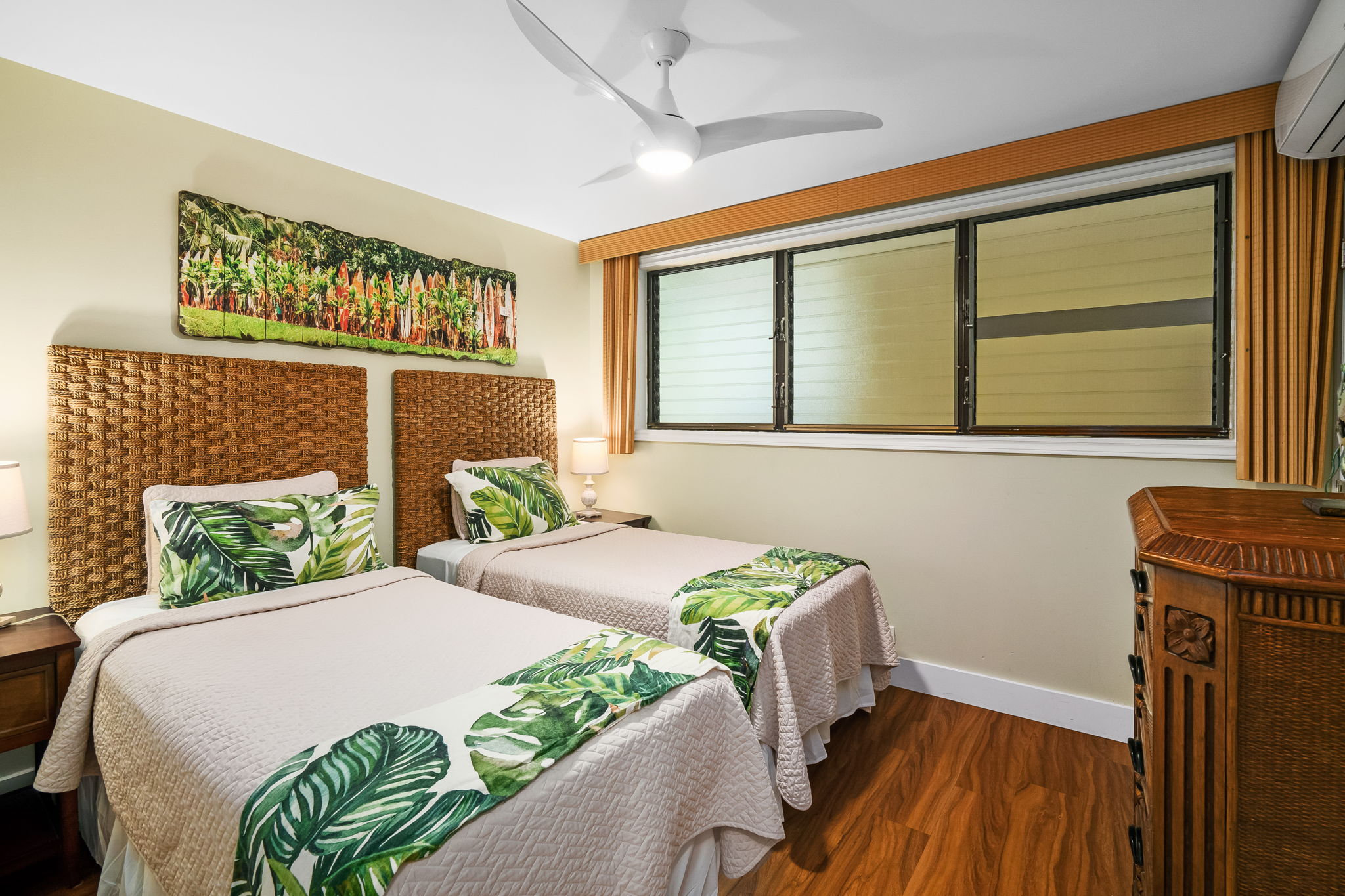 1775 Pe'e Road, Unit 101A Koloa, HI 96756 - Photo 16 of 25 a bedroom with a bed and a window