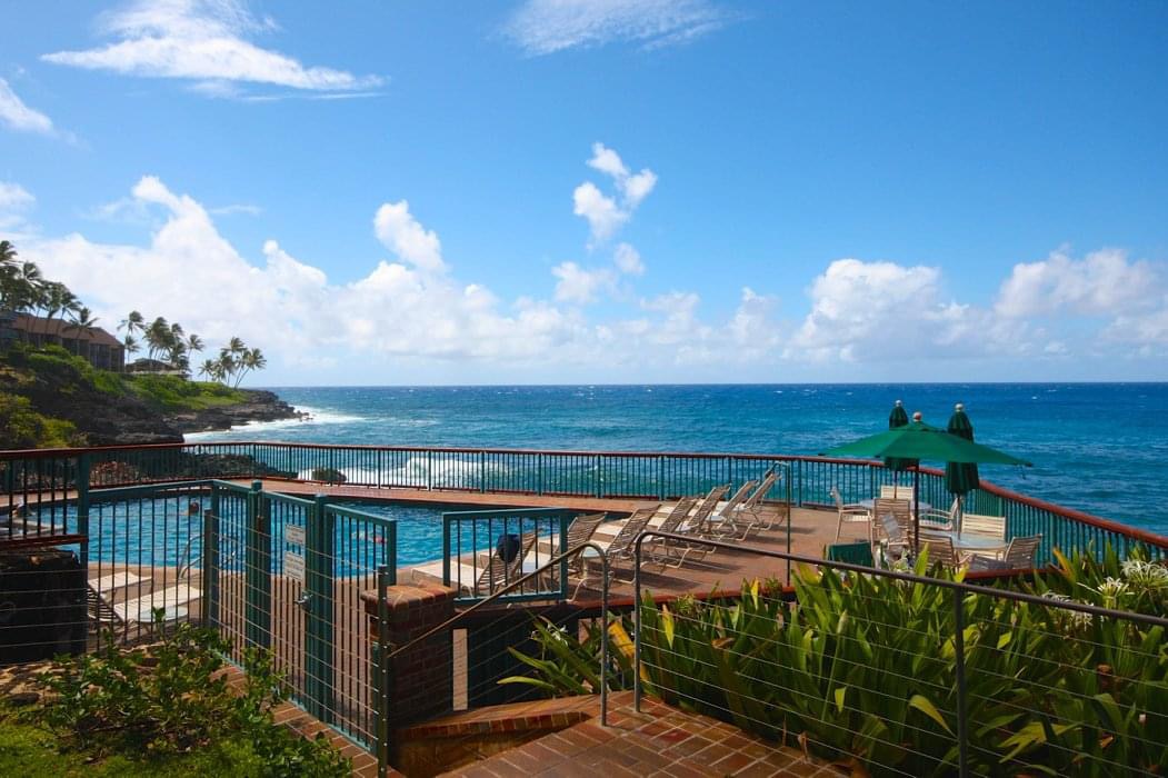 1775 Pe'e Road, Unit 101A Koloa, HI 96756 - Photo 23 of 25 a view of a balcony with an outdoor space