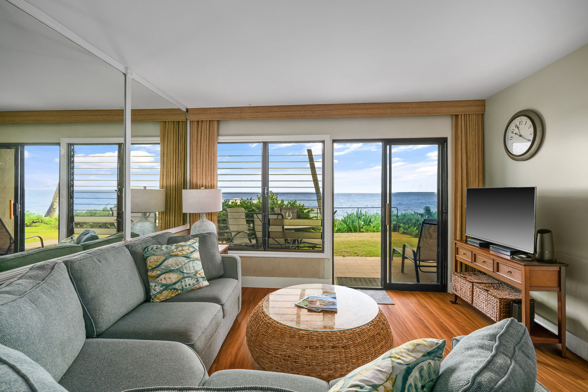 1775 Pe'e Road, Unit 101A Koloa, HI 96756 - Photo 3 of 25 a living room with furniture and a large window