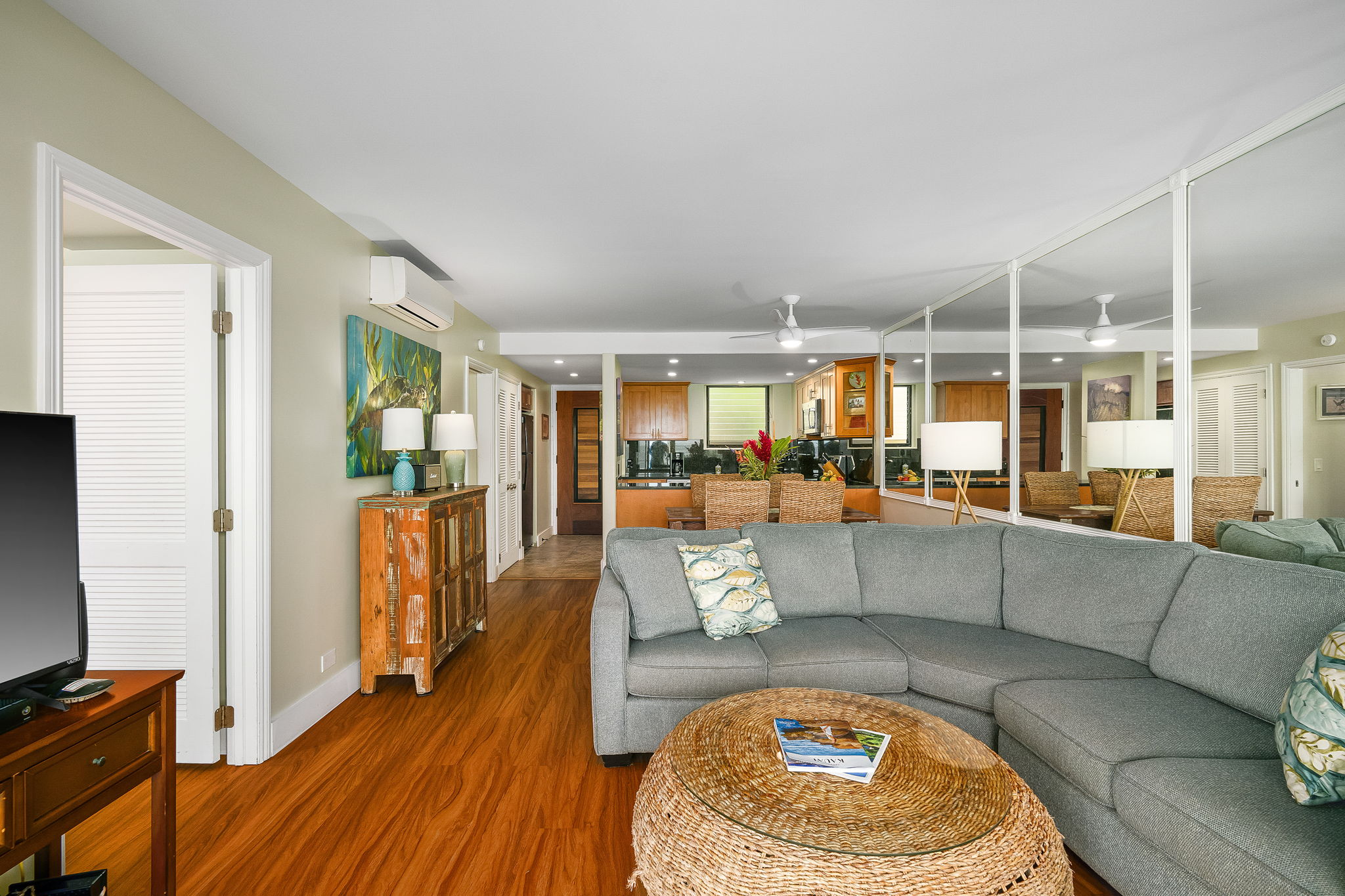 1775 Pe'e Road, Unit 101A Koloa, HI 96756 - Photo 10 of 25 a living room with furniture and a table