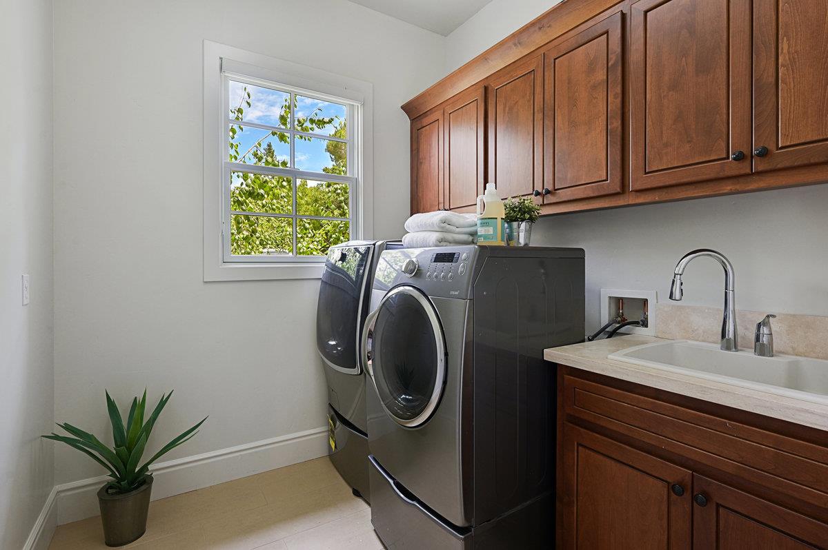 782 Dixon Way Los Altos, CA 94022 - Photo 19 of 38 a utility room with sink dryer and washer
