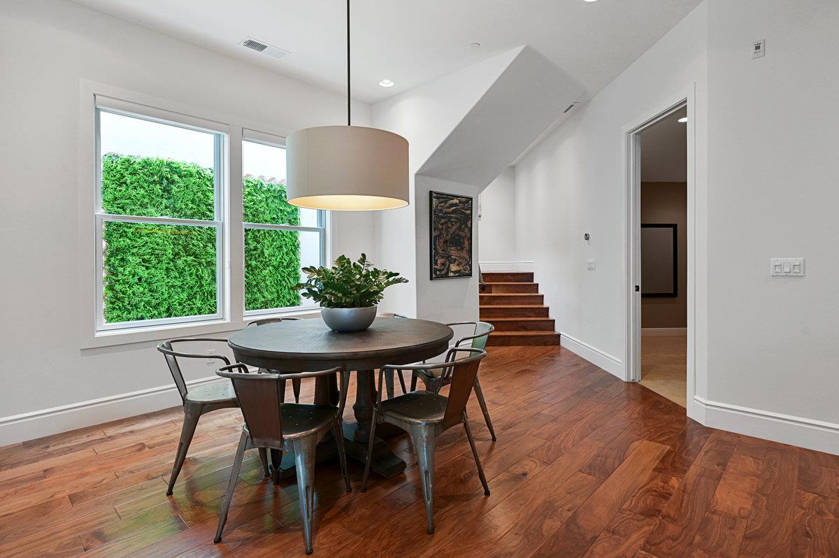782 Dixon Way Los Altos, CA 94022 - Photo 21 of 38 a view of a dining room with furniture window and wooden floor