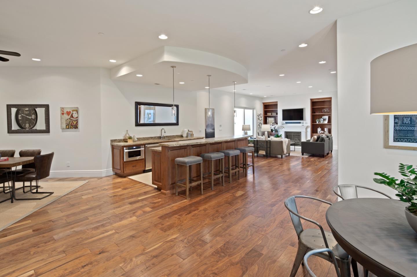 782 Dixon Way Los Altos, CA 94022 - Photo 23 of 38 a living room with stainless steel appliances kitchen island granite countertop furniture wooden floor and a kitchen view