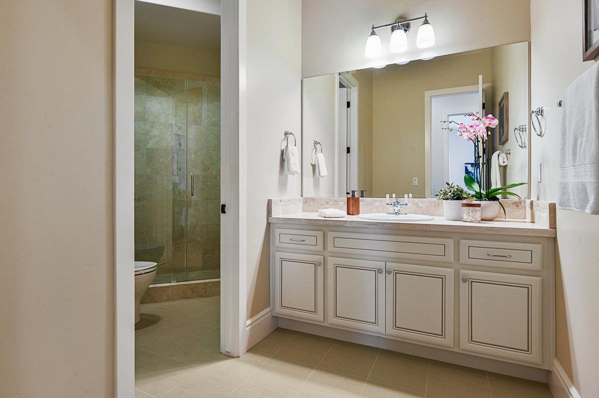 782 Dixon Way Los Altos, CA 94022 - Photo 30 of 38 a bathroom with a granite countertop sink and a mirror