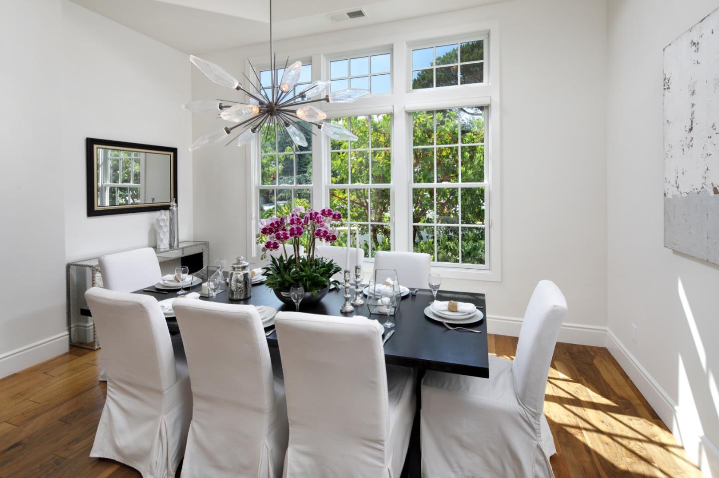 782 Dixon Way Los Altos, CA 94022 - Photo 3 of 38 a view of a dining room with furniture wooden floor and chandelier