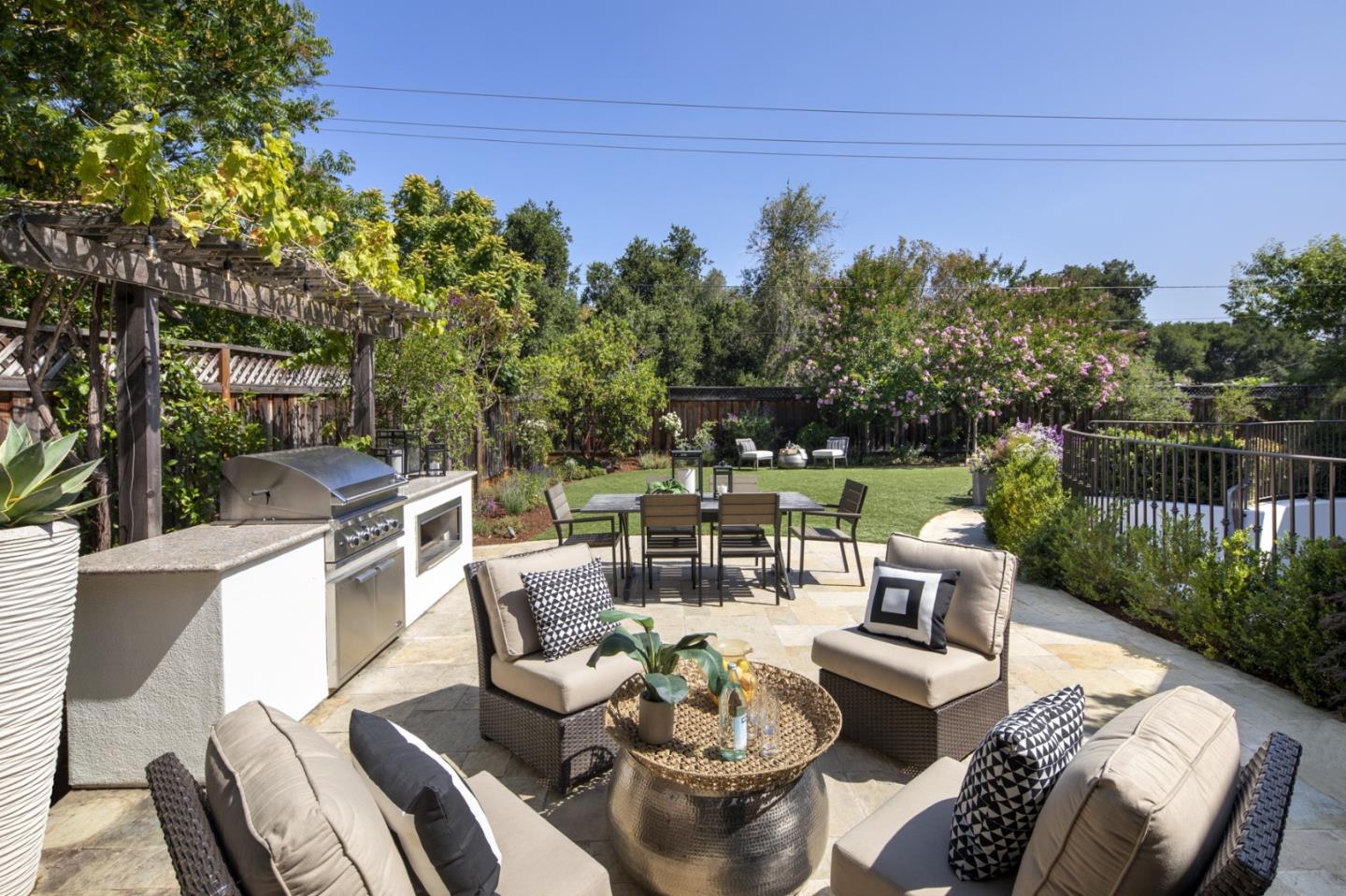 782 Dixon Way Los Altos, CA 94022 - Photo 34 of 38 a view of a patio with couches table and chairs and potted plants