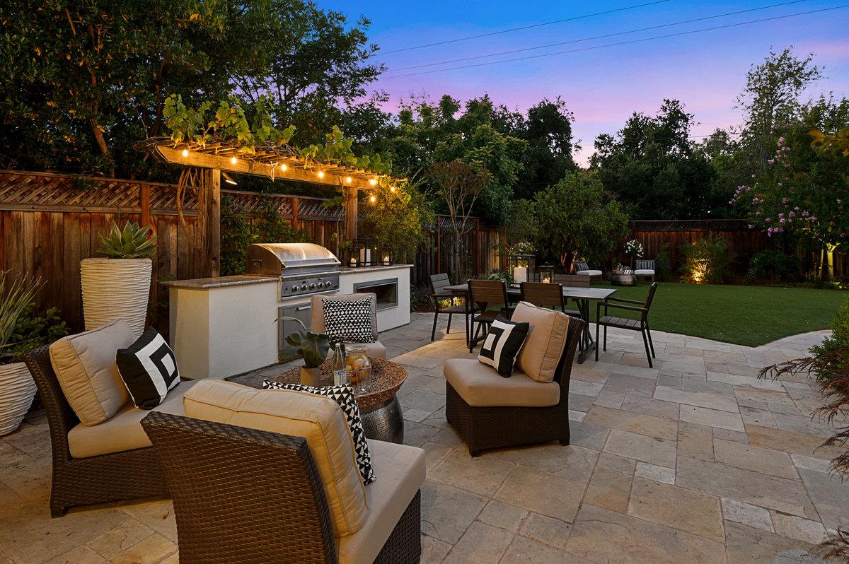 782 Dixon Way Los Altos, CA 94022 - Photo 35 of 38 a view of a patio with couches and table and chairs with wooden fence