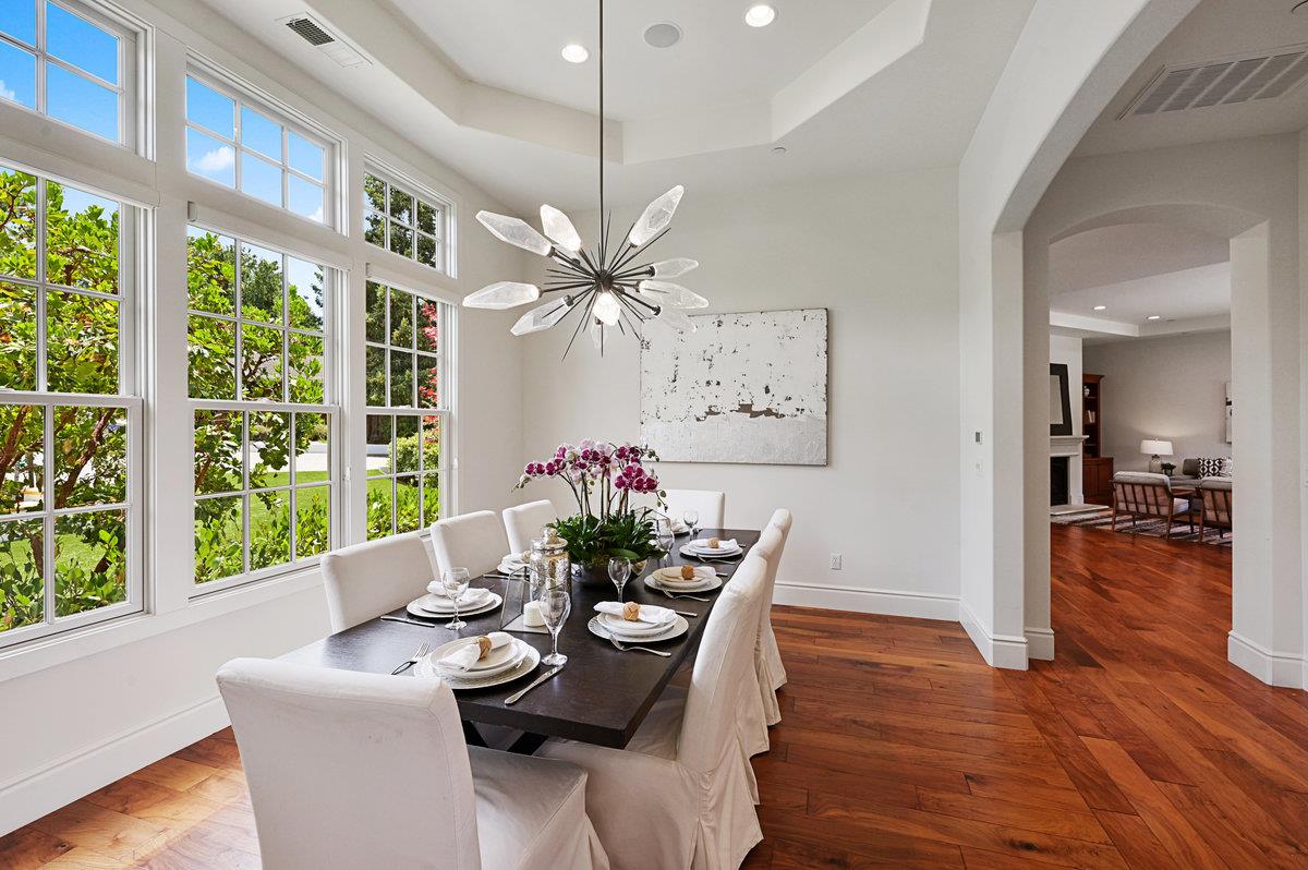 782 Dixon Way Los Altos, CA 94022 - Photo 4 of 38 a dining room with furniture a large window and wooden floor