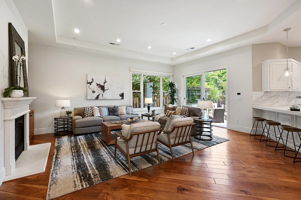 782 Dixon Way Los Altos, CA 94022 - Photo 9 of 38 a living room with lots of furniture wooden floor and a fireplace