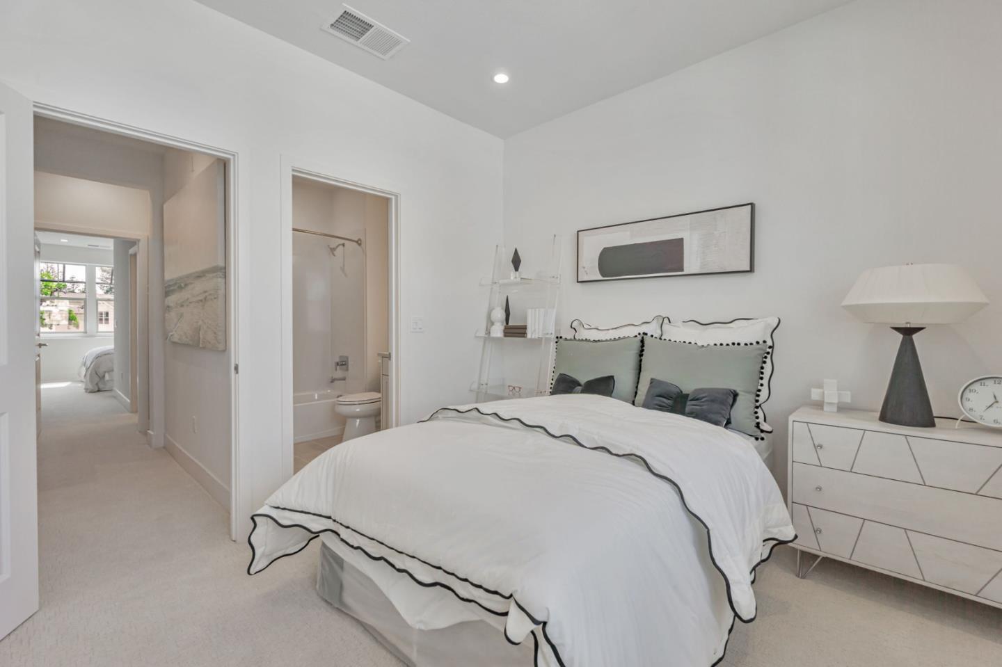 146 Oak Circle Walnut Creek, CA 94597 - Photo 5 of 10 a bedroom with a bed and a lamp