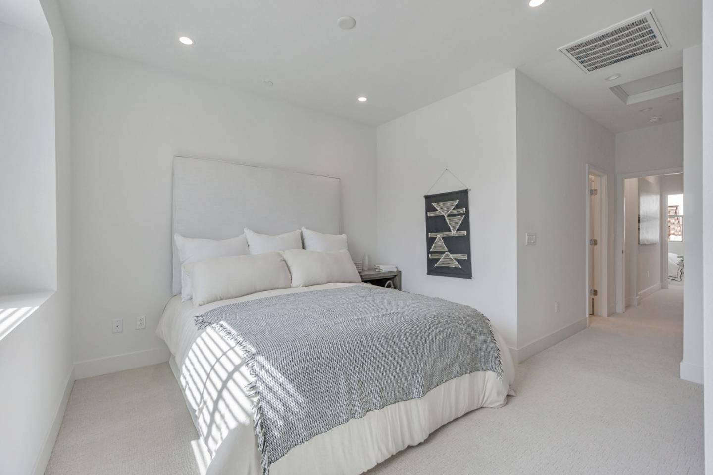 146 Oak Circle Walnut Creek, CA 94597 - Photo 7 of 10 a bedroom with a bed and a night stand