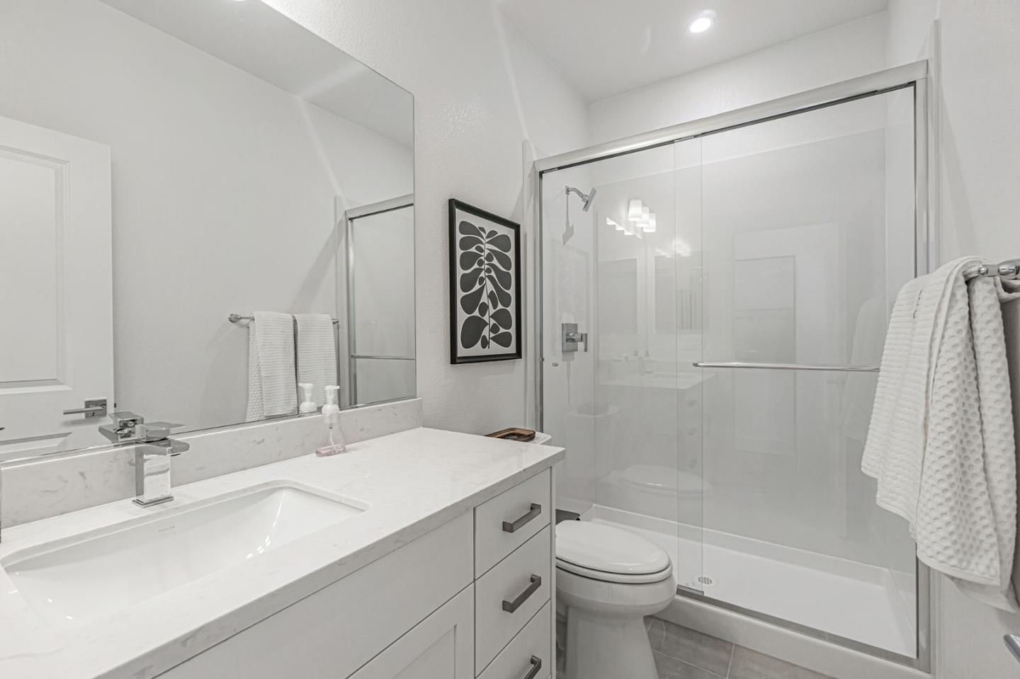 146 Oak Circle Walnut Creek, CA 94597 - Photo 8 of 10 a bathroom with a sink a toilet and shower