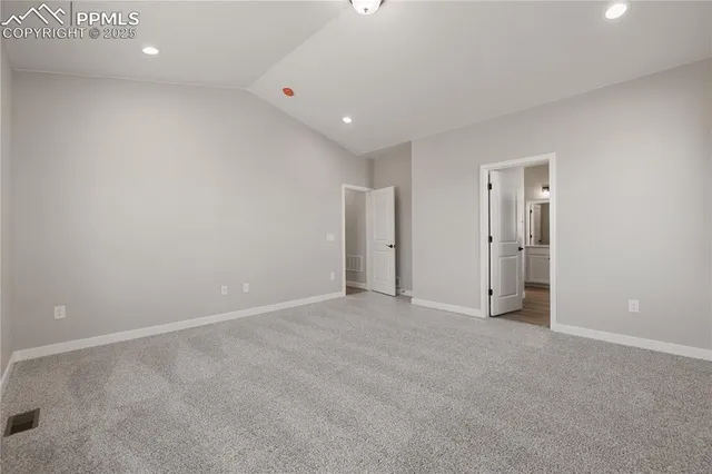 a bathroom with a double vanity sink a mirror and a bathtub