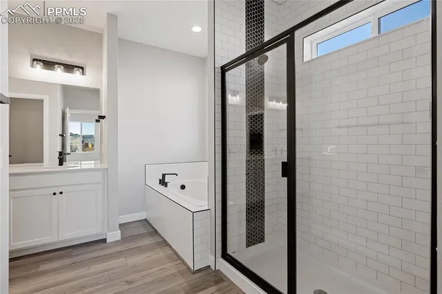 a white bath tub sitting next to a window