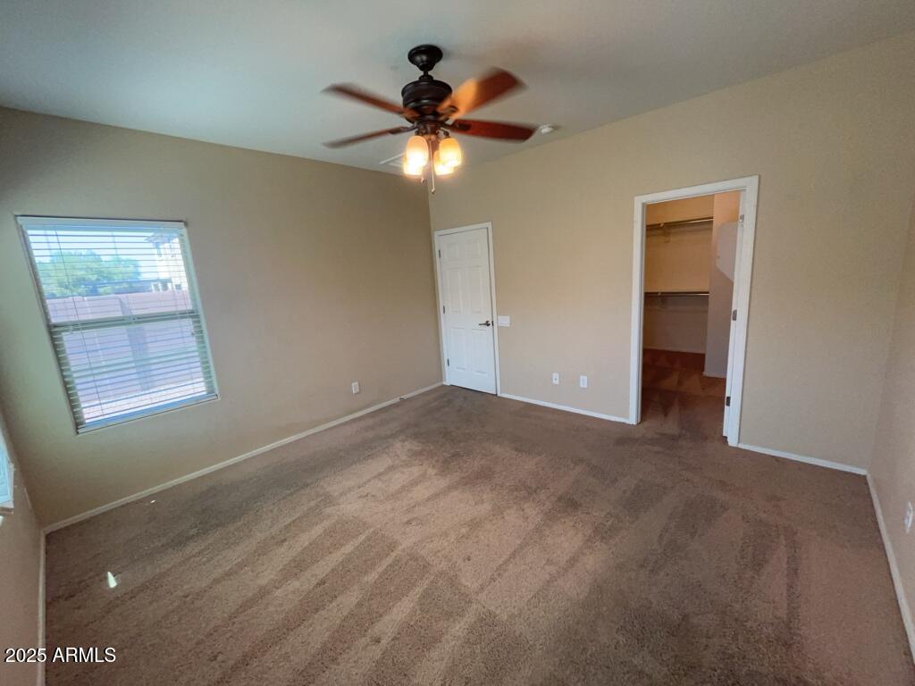 11021 East Sutter Avenue Mesa, AZ 85212 - Photo 17 of 26 a view of an empty room with a window