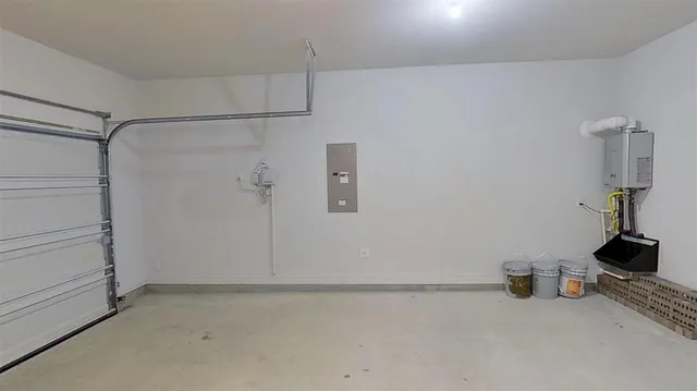 a kitchen with a refrigerator and a stove