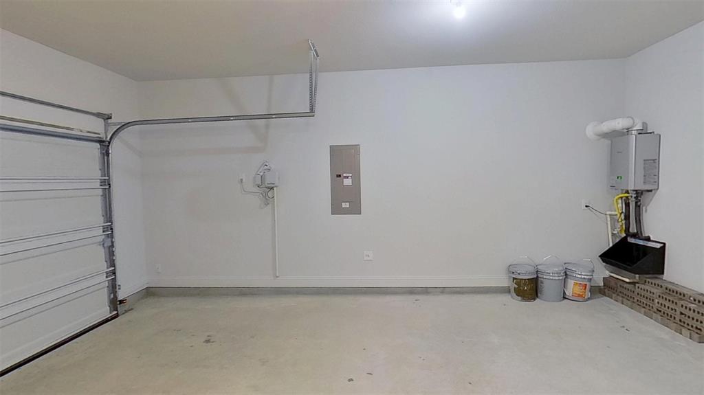 415 Magellan Road Seagoville, TX 75159 - Photo 14 of 14 a kitchen with a refrigerator and a stove