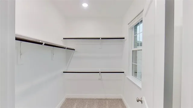 a view of small space with racks on the wall