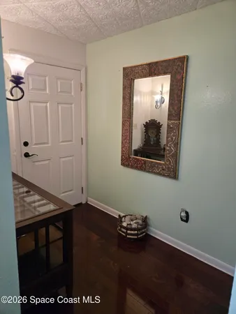 a bedroom with a bed and dresser