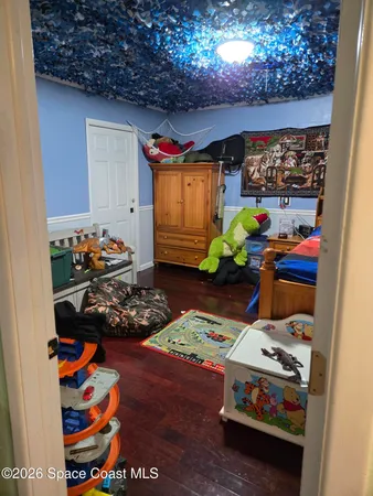 a room with toys and cars