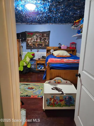 a room with toys and cars