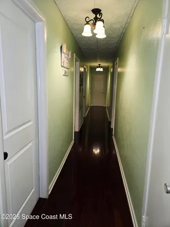 a room with a table and a clock