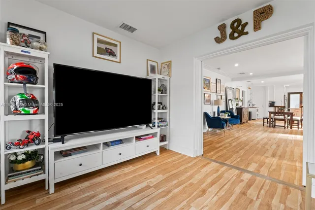 a bedroom with a bed and a desk