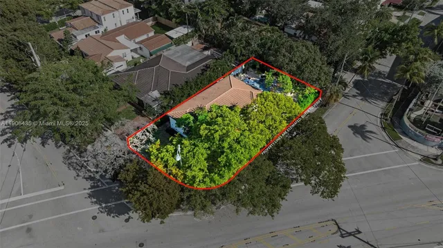 a backyard of a house with lots of green space