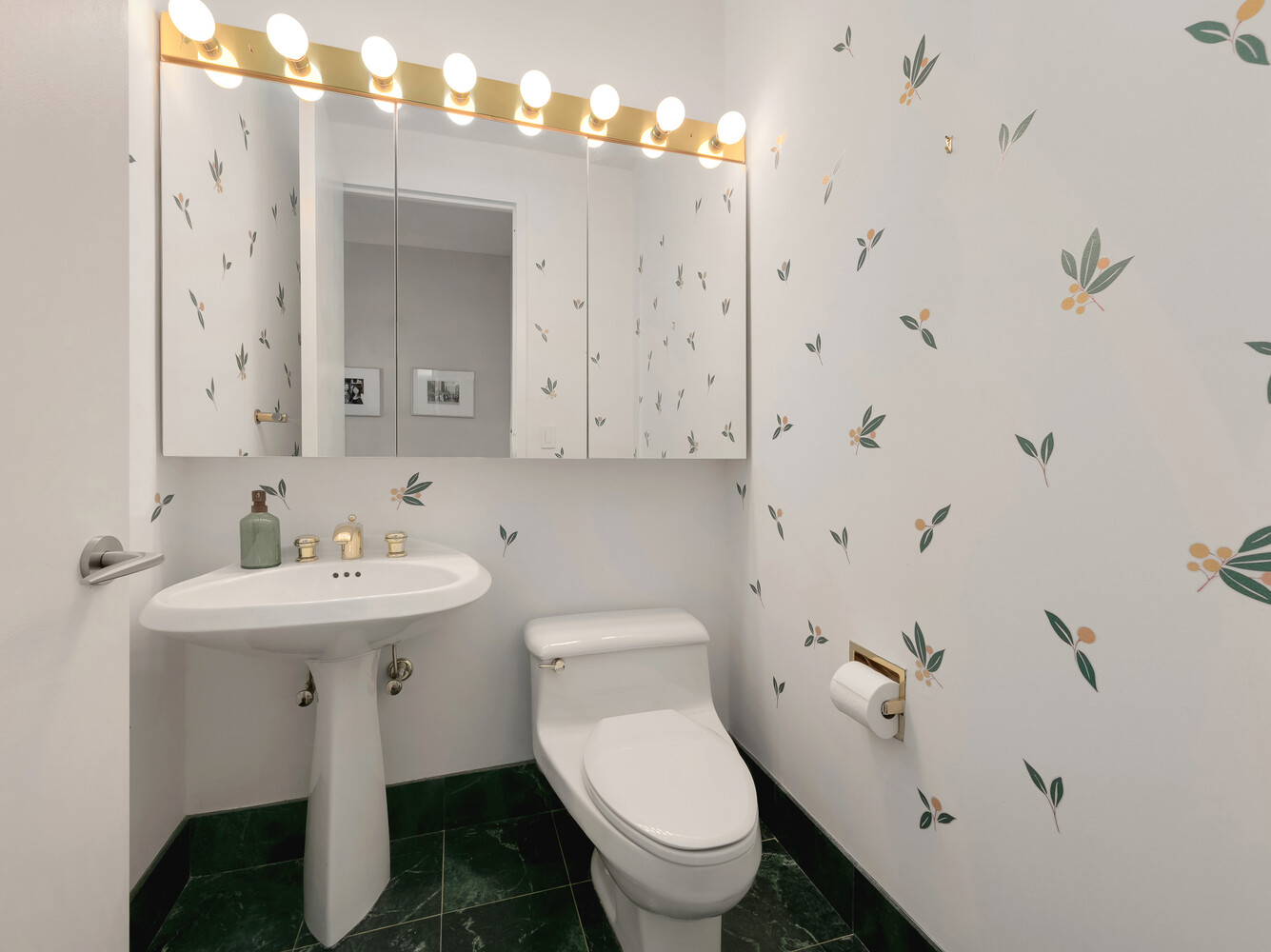 101 West 67th Street, Unit 52E Manhattan, NY 10023 - Photo 11 of 21 a bathroom with a toilet sink and mirror