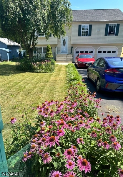 21 Marble Street Washington, NJ 07882 - Photo 18 of 21 a view of a house with a yard and garden