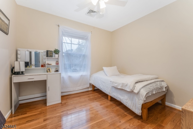 21 Marble Street Washington, NJ 07882 - Photo 8 of 21 a spacious bedroom with a bed and a dresser