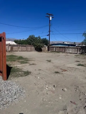 a view of a walk in view of a yard